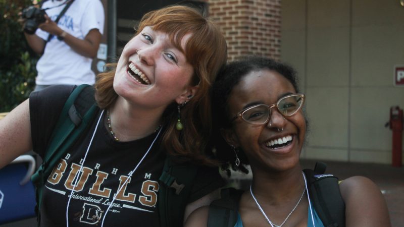 Two students preparing to leave the Carolina Union to attend the NC Fellows 2022 retreat.