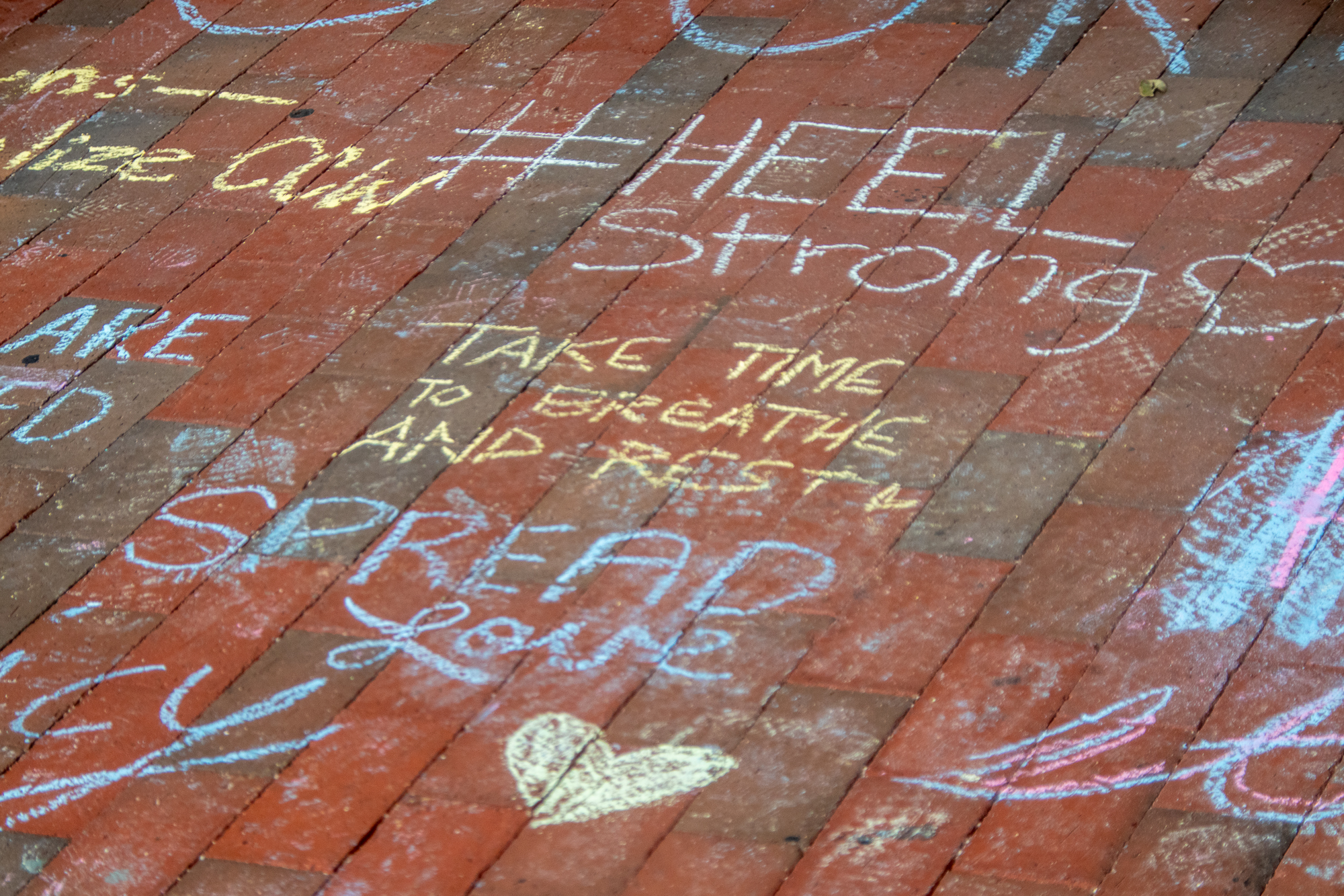 Messages in front of the Carolina Union written by students.