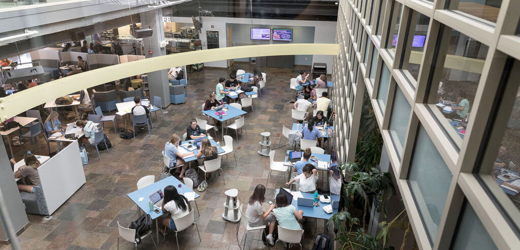 Photo showing a aerial view of the West Lounge are in the Carolina Union.