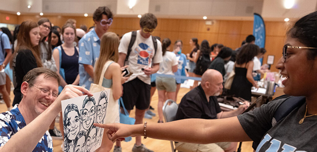 UNC students participating in various events in the Great Hall at the Carolina Union.