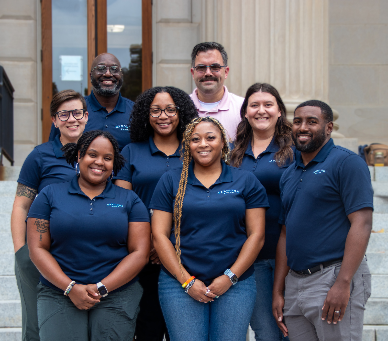 A photo of SLL professional staff members posing at Wilson Library.